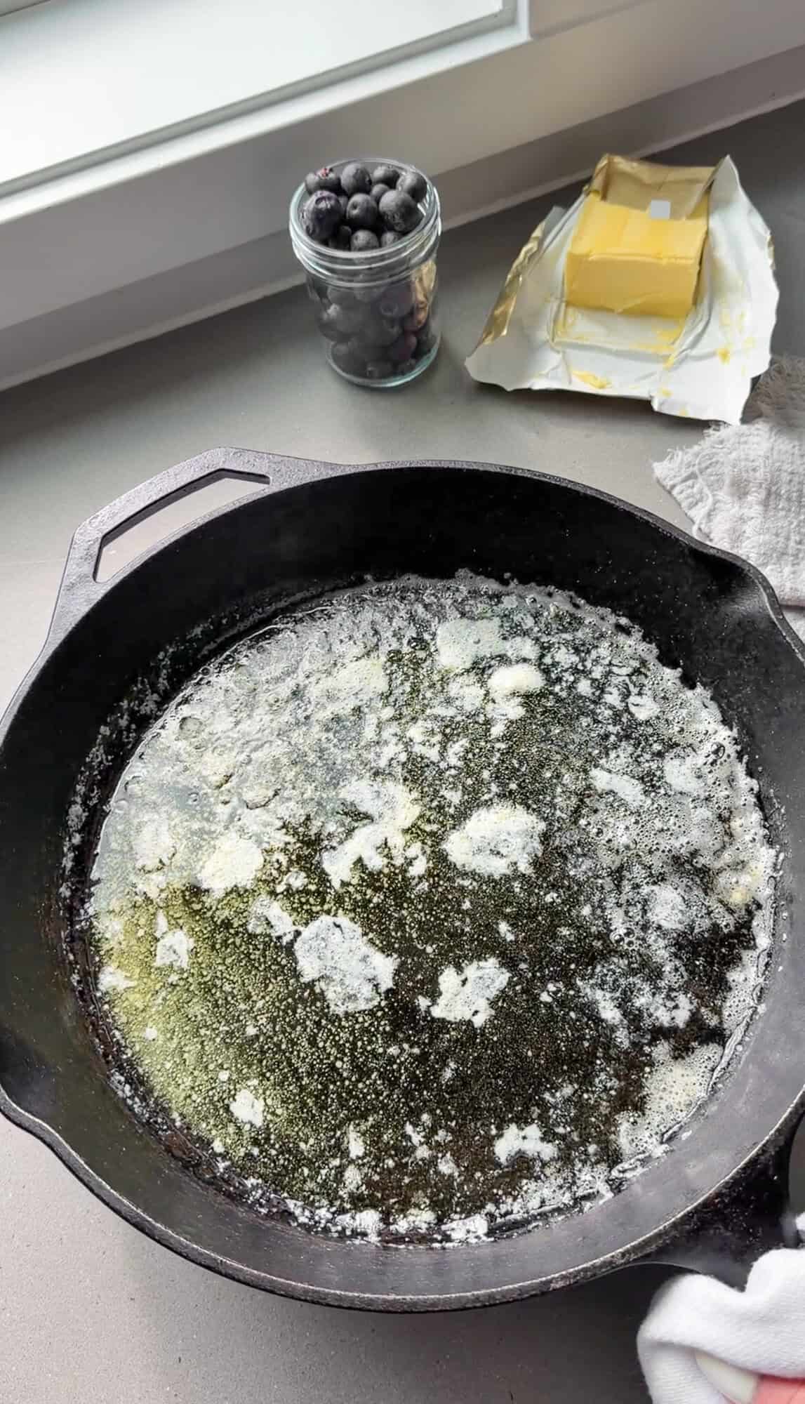 melted sizzling butter in a cast-iron skillet