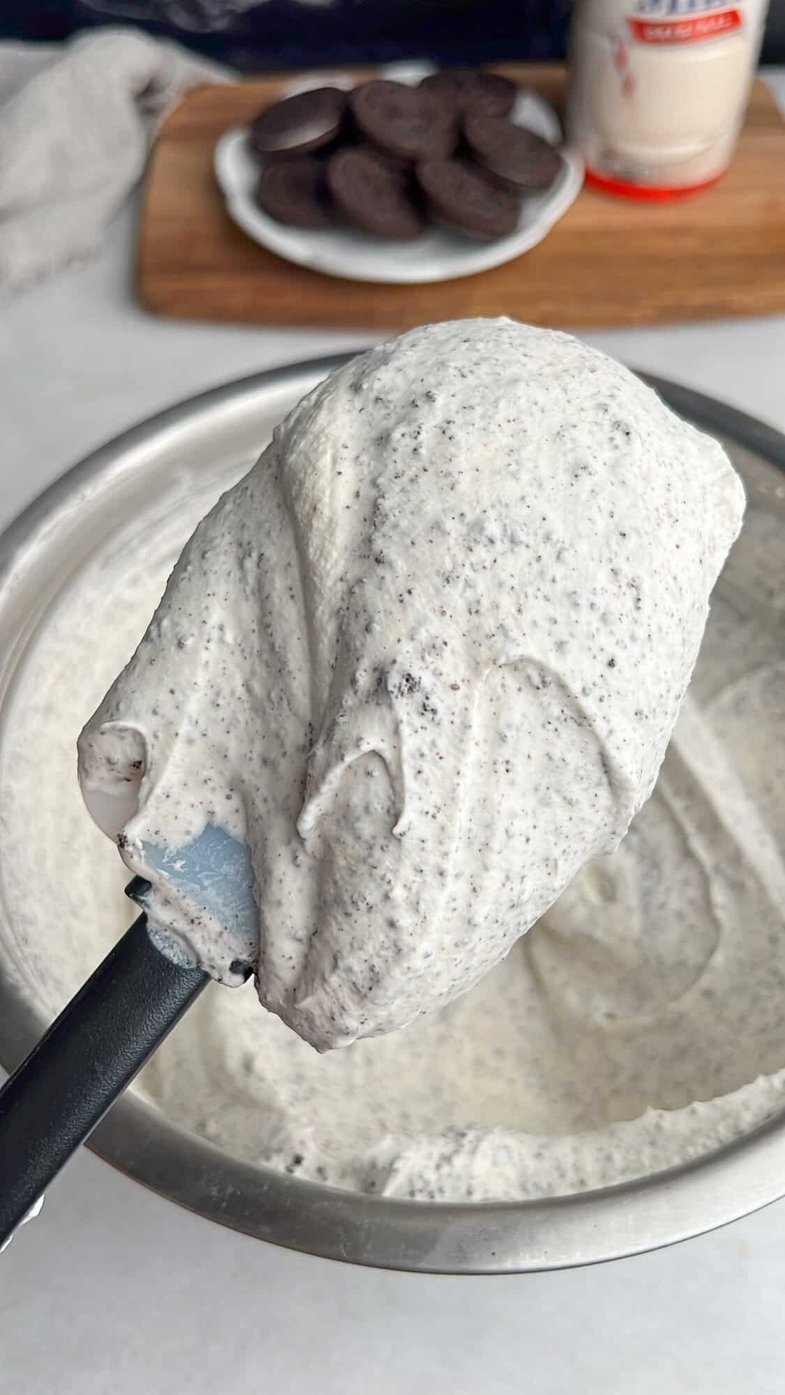 oreo crumbs mixed into whipped cream