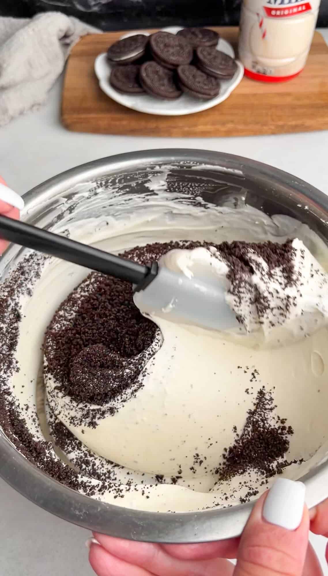 oreo crumbs folded into whipped cream