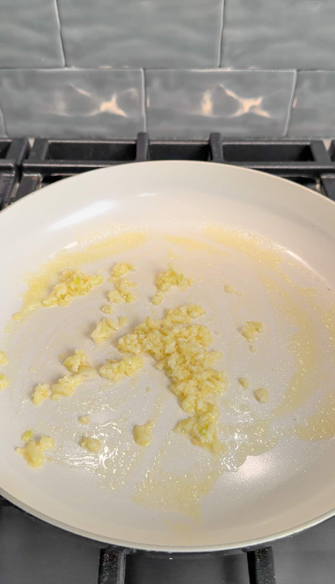 sauteing the garlic in butter for pasta al limone