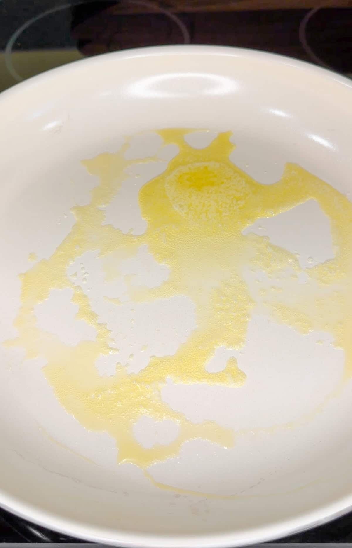 butter sizzling in a skillet