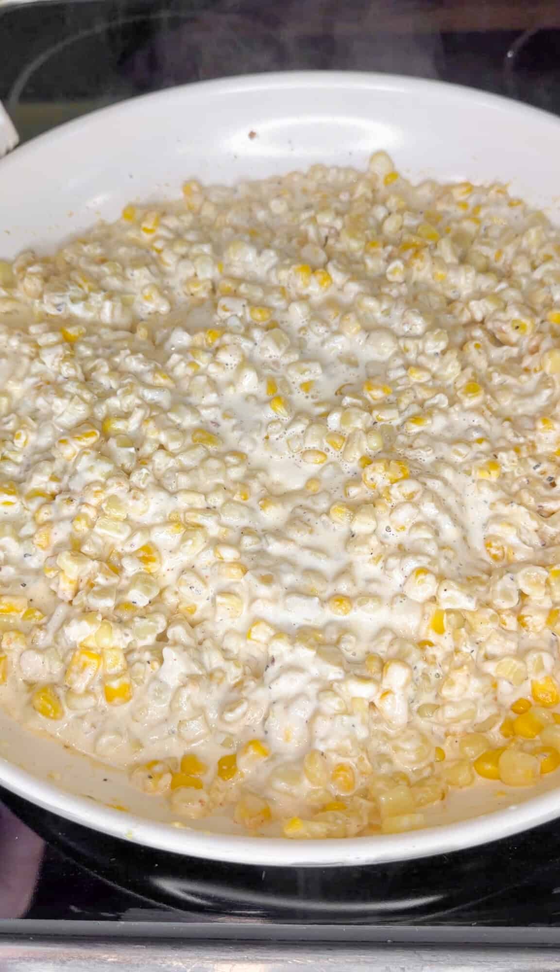 hot corn dip in a pan