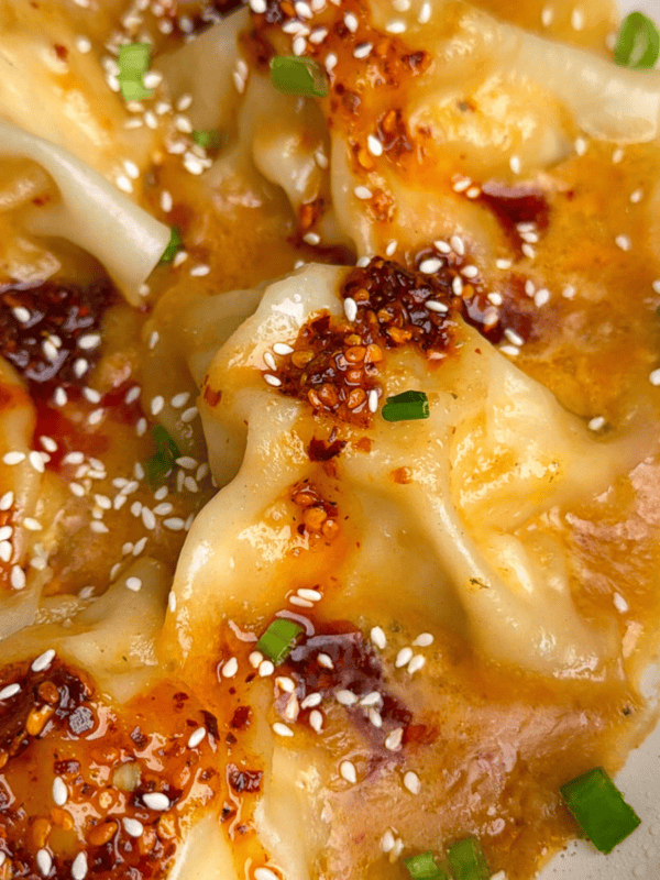 blanket dumplings in a pan with Thai peanut sauce