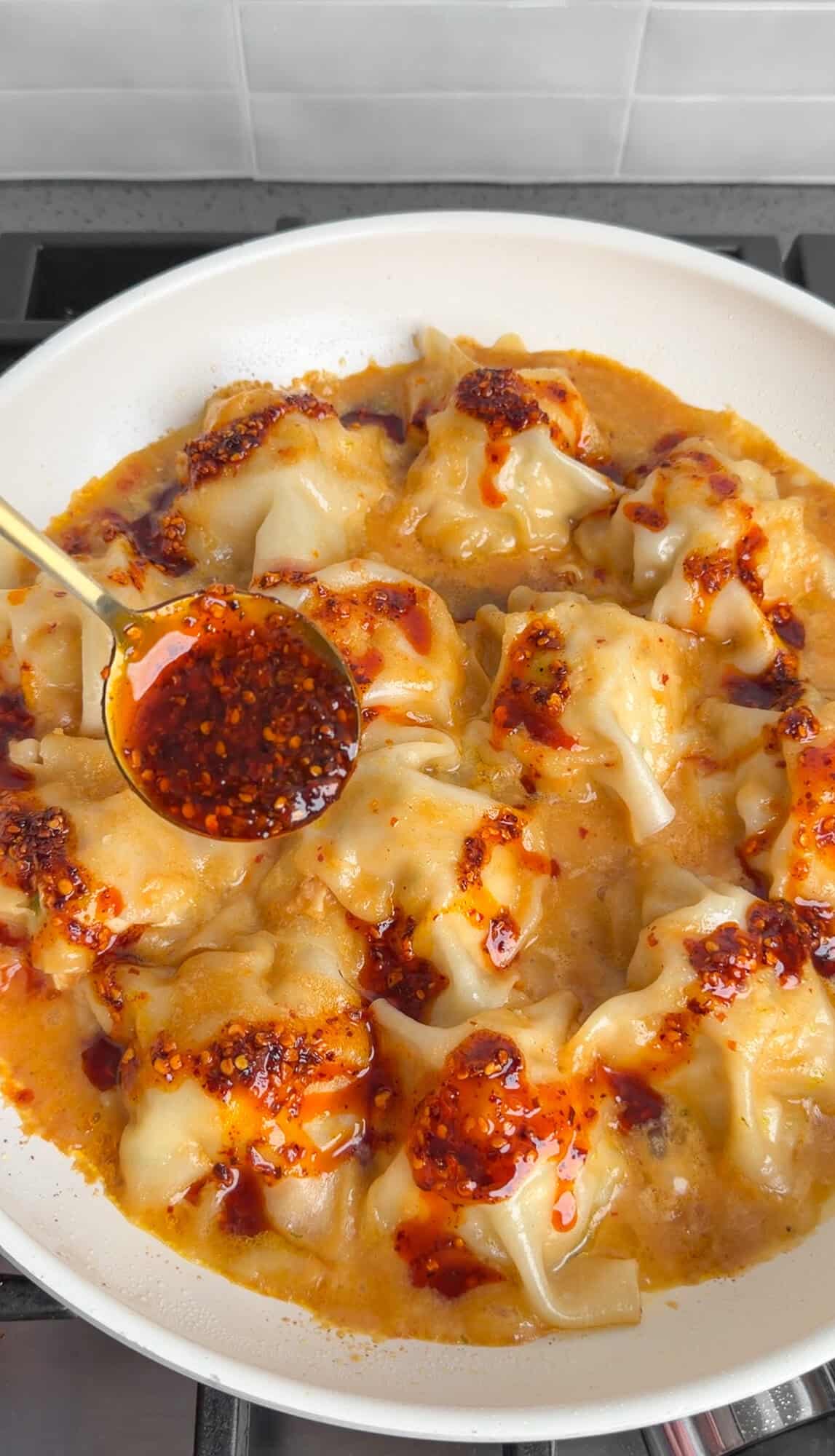 topping blanket dumplings with chili oil