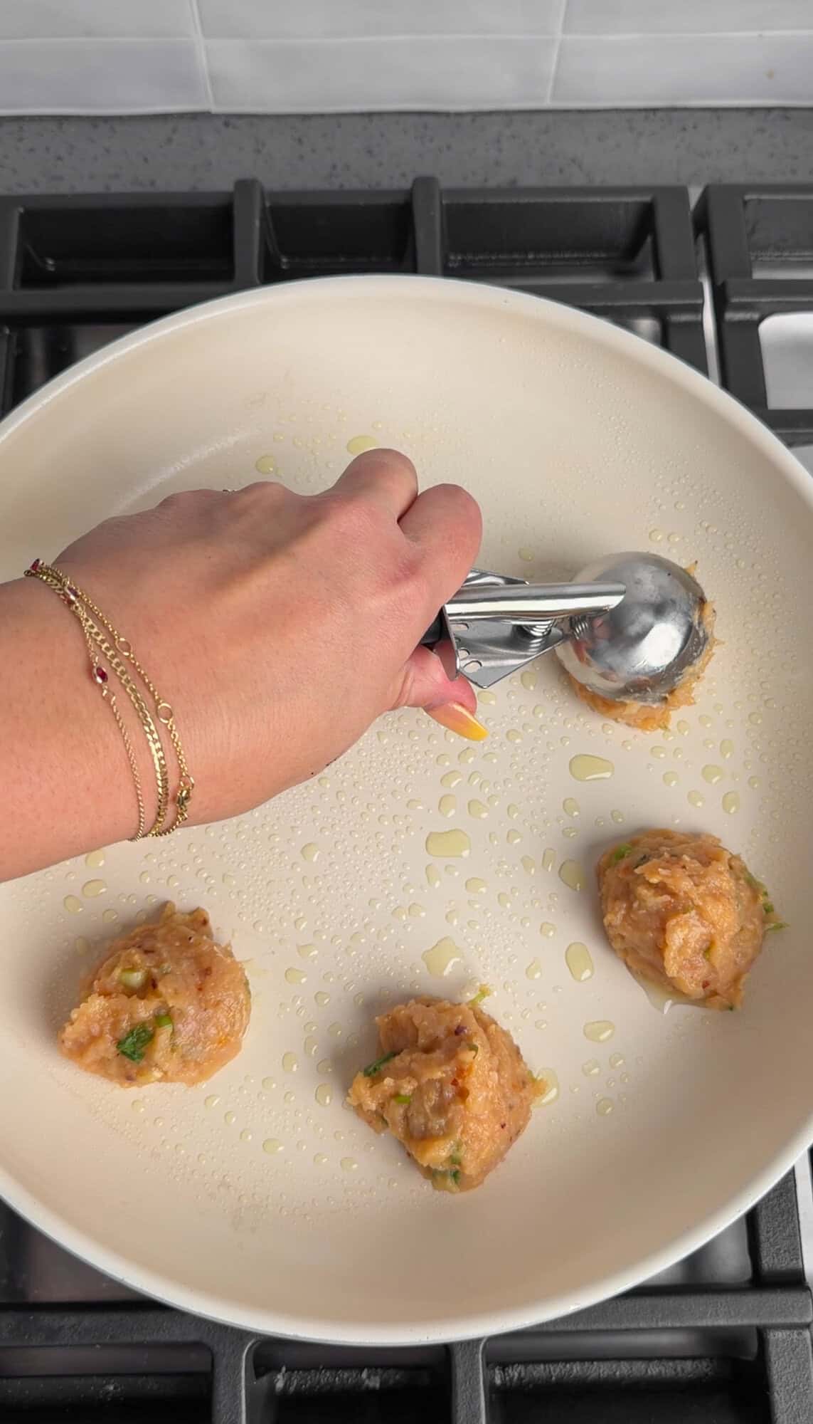 scooping the dumplings