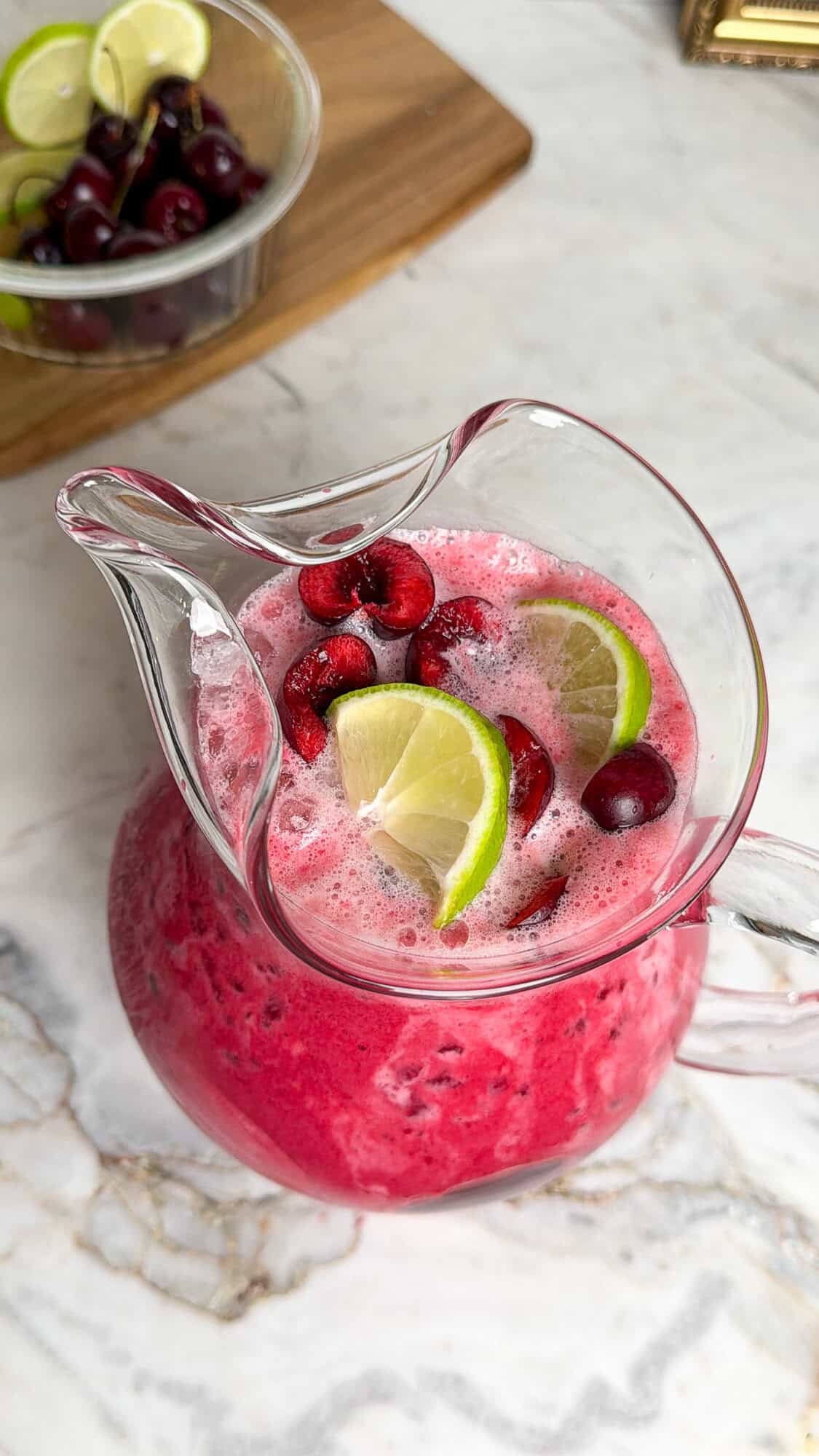 cherry limeade in a pitcher