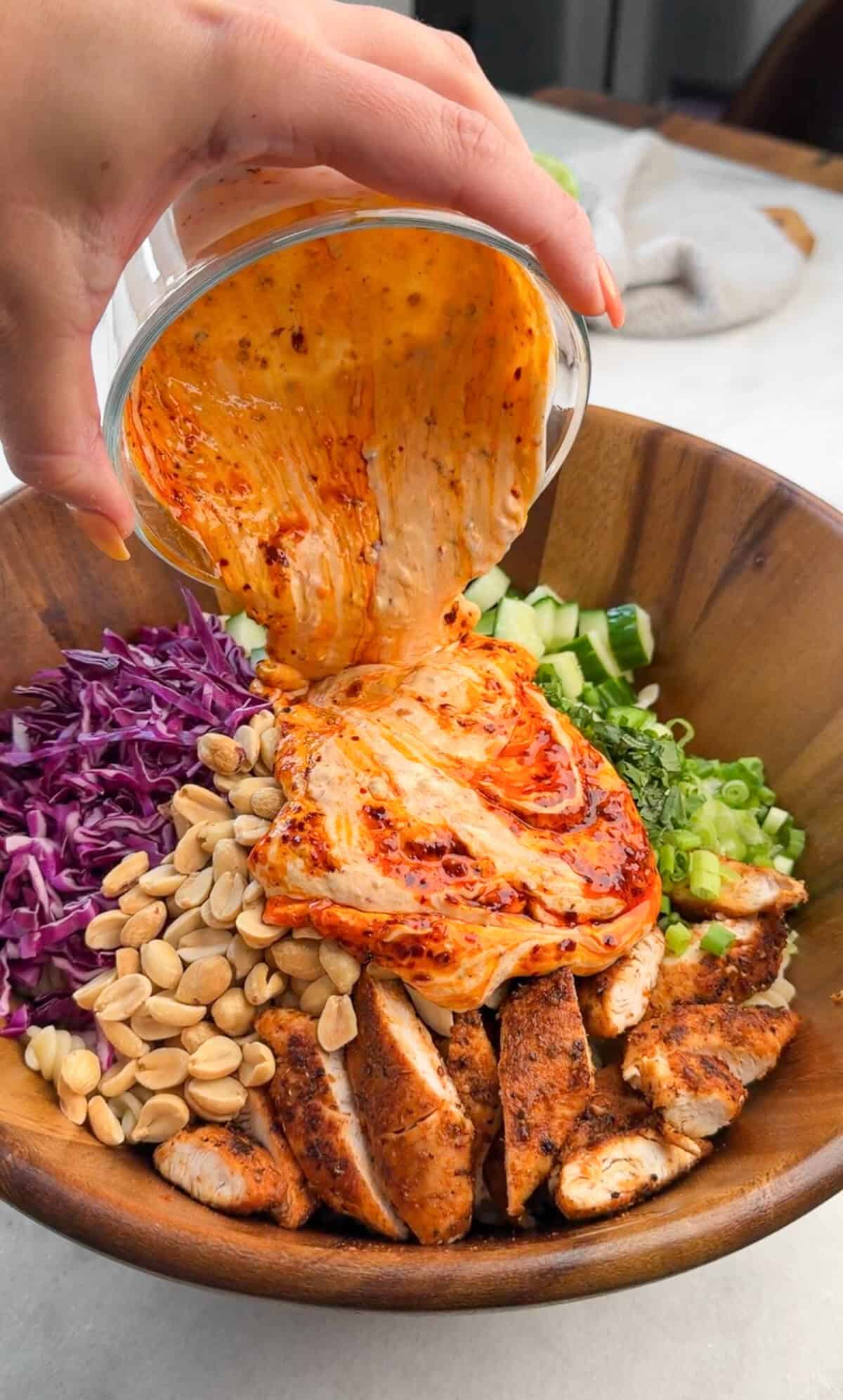 pasta salad in a bowl with chili oil honey dressing