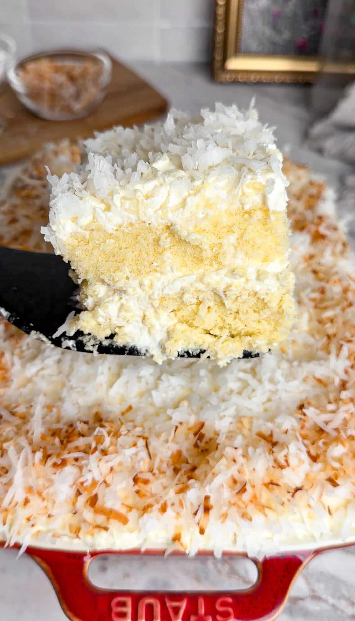 coconut cake slice on a spatula