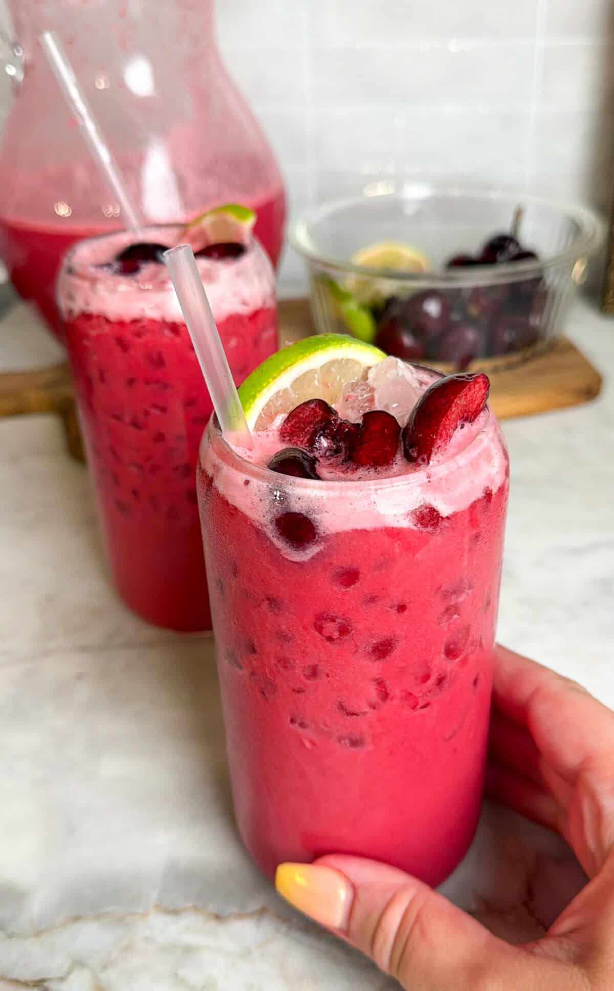 cherry limeade in two glasses