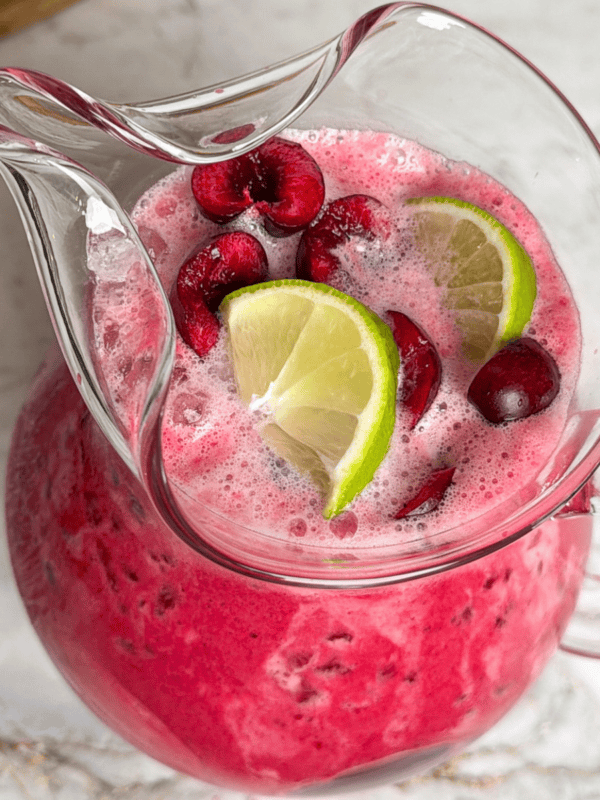 cherry limeade in a pitcher
