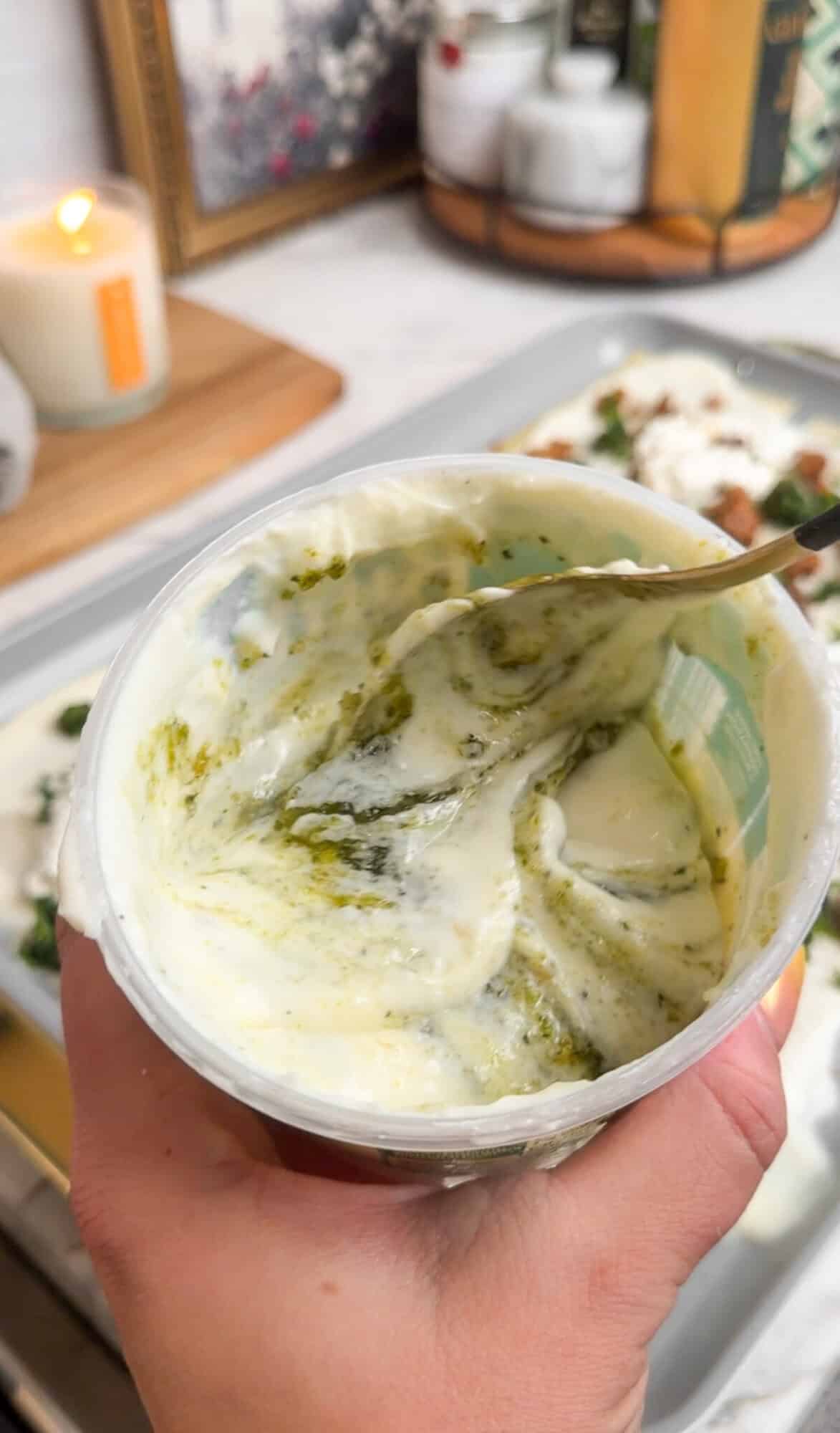 pesto mixing with alfredo sauce