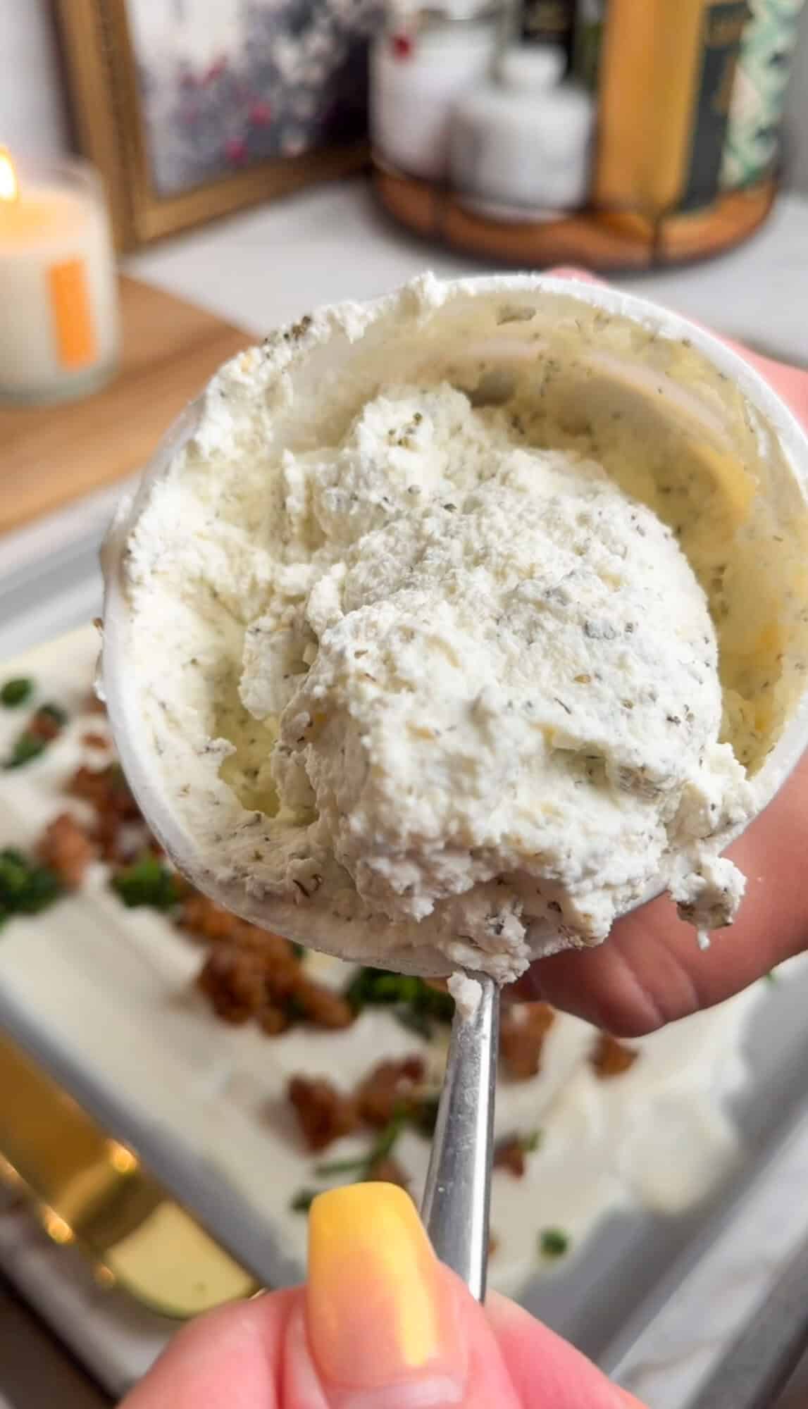seasoned ricotta on a spoon