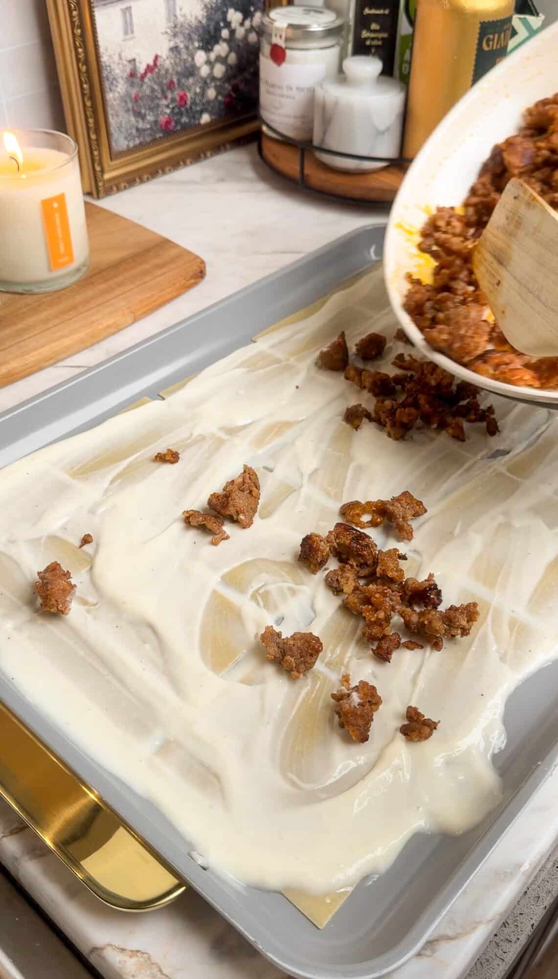 building first layer of sheet pan lasagna