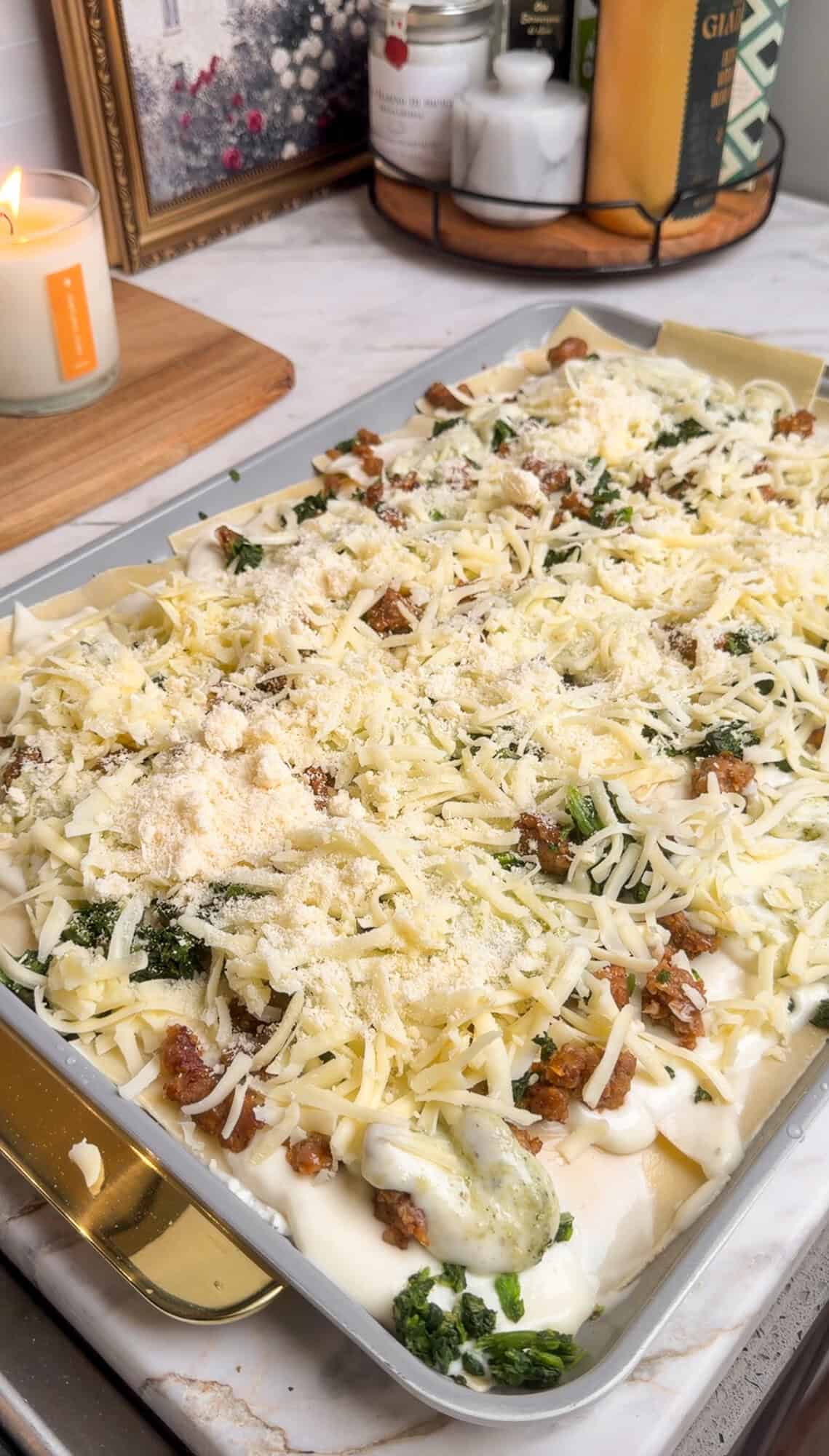 final layer of creamy alfredo sheet pan lasagna