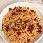 a bowl of french onion mac and cheese with bacon