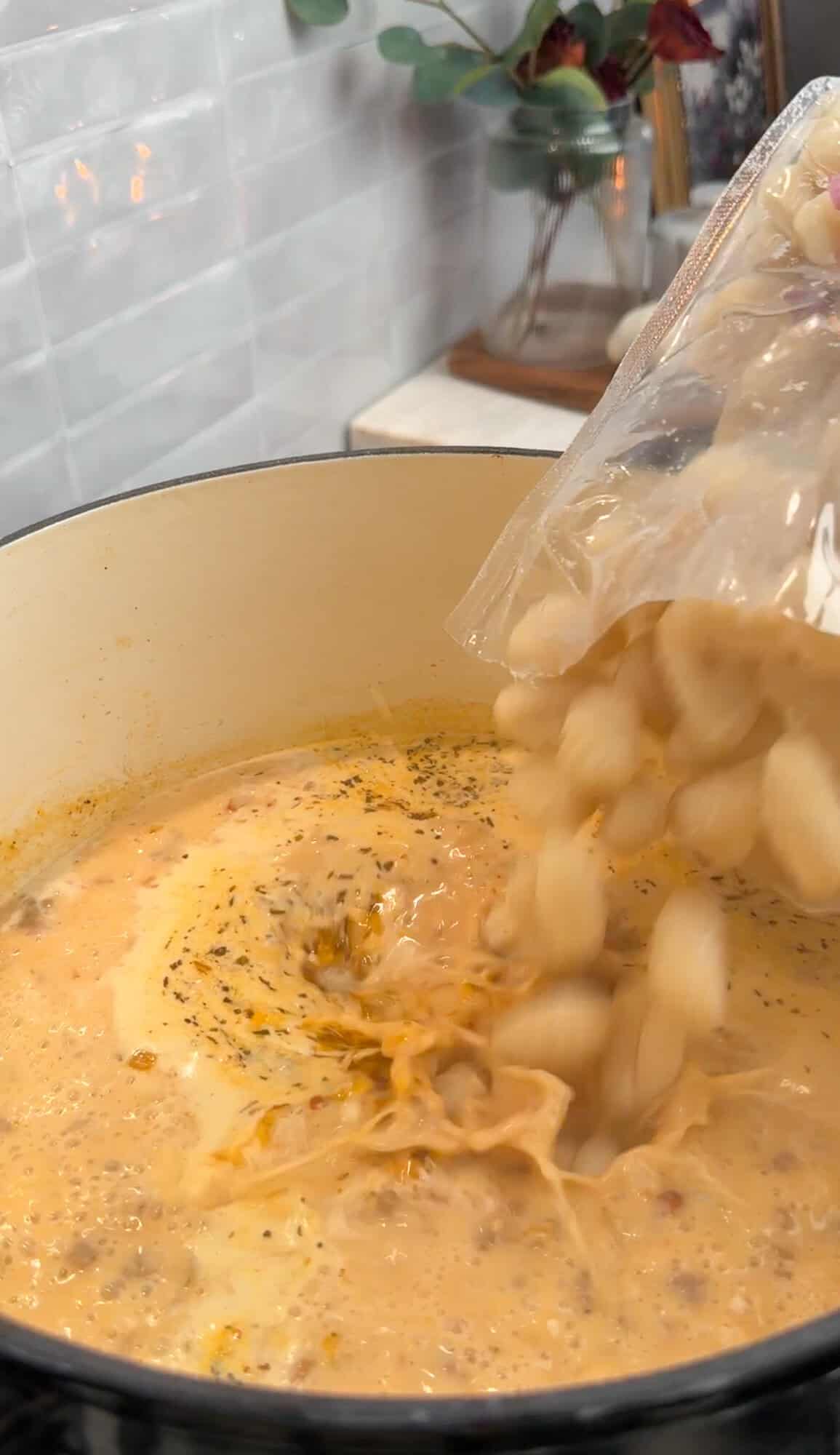 gnocchi cooking in the soup liquid