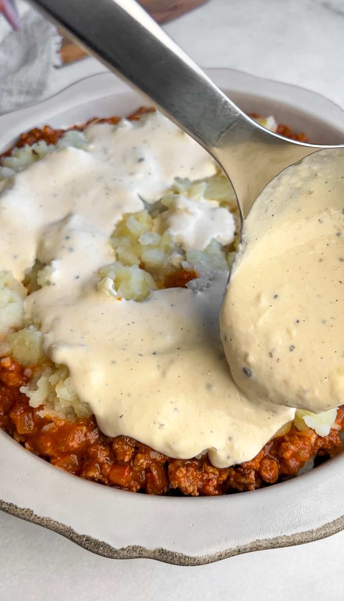 assembling mashed potato lasagna