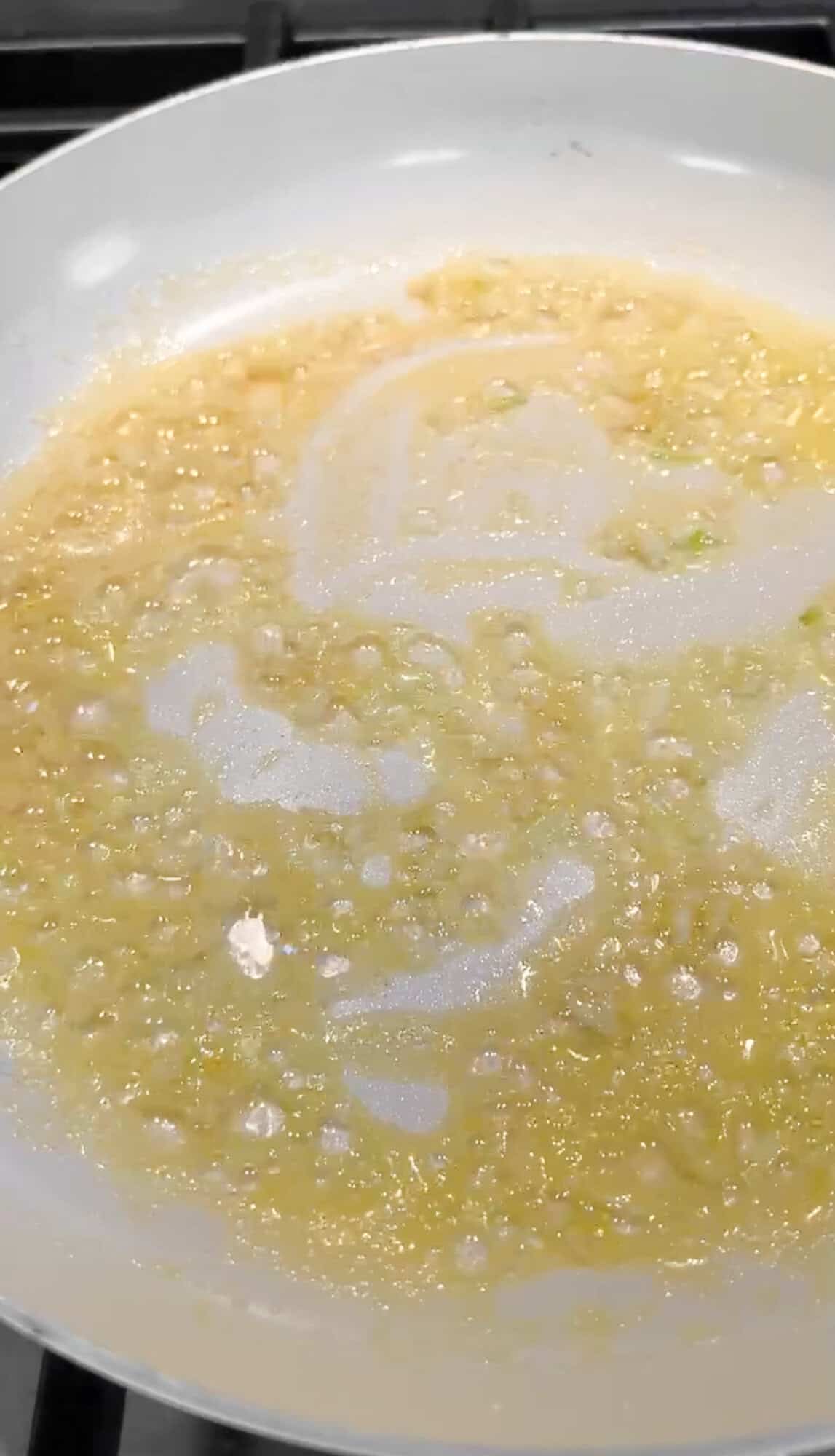 sauteeing garlic and butter for alfredo sauce