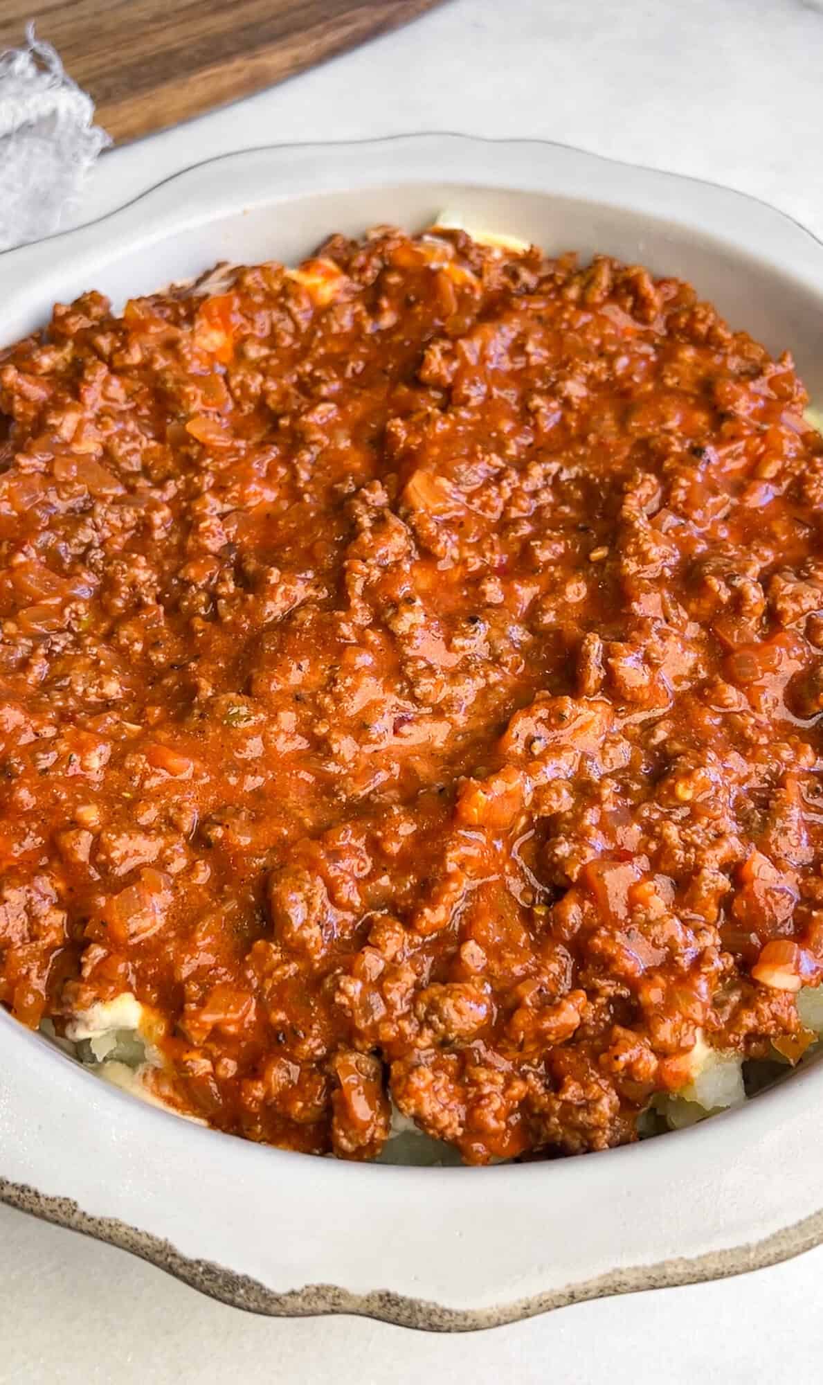 assembling mashed potato lasagna
