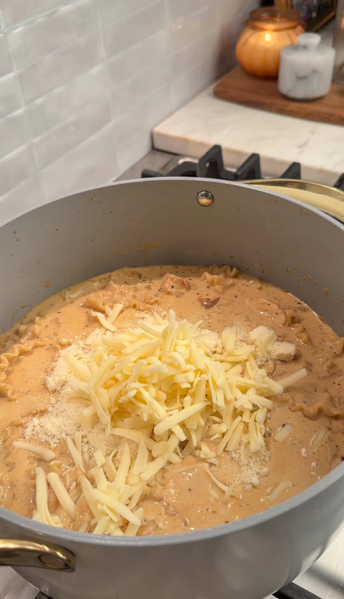 adding cheese to chicken alfredo soup
