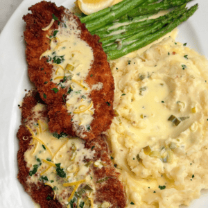 cheesecake factory copycat chicken costoletta with mashed potatoes and asparagus