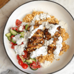 Overhead image of a Greek chicken bowl.