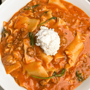 lasagna soup with a dollop of ricotta filling