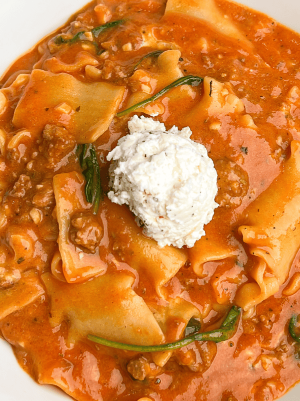 lasagna soup with a dollop of ricotta filling