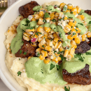 steak bowls with mashed potatoes and street corn
