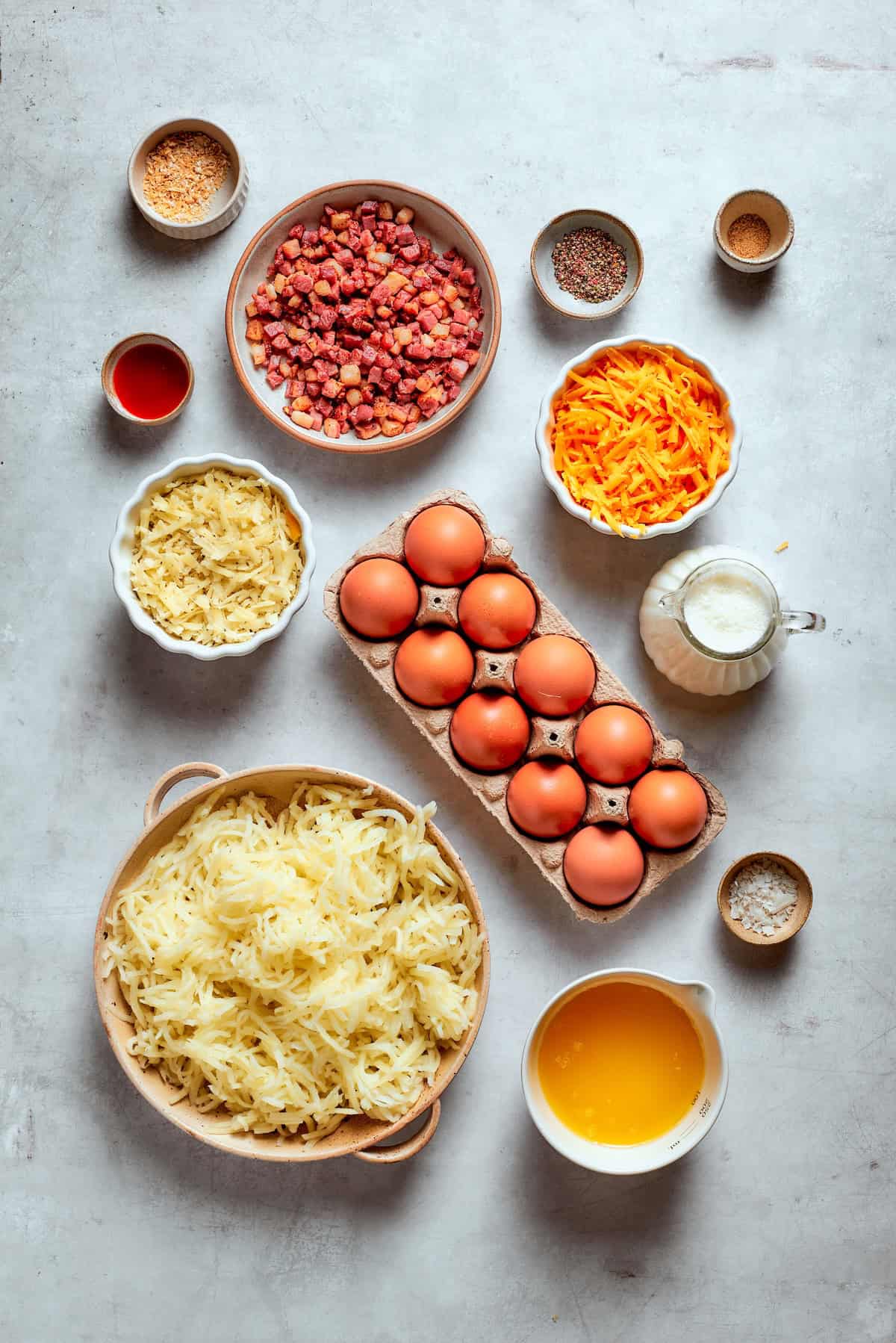 Loaded with bacon, eggs, and cheese and baked in one dish, this hashbrown breakfast casserole is the easiest way to do brunch for a crowd. Ingredients for hashbrown breakfast casserole.