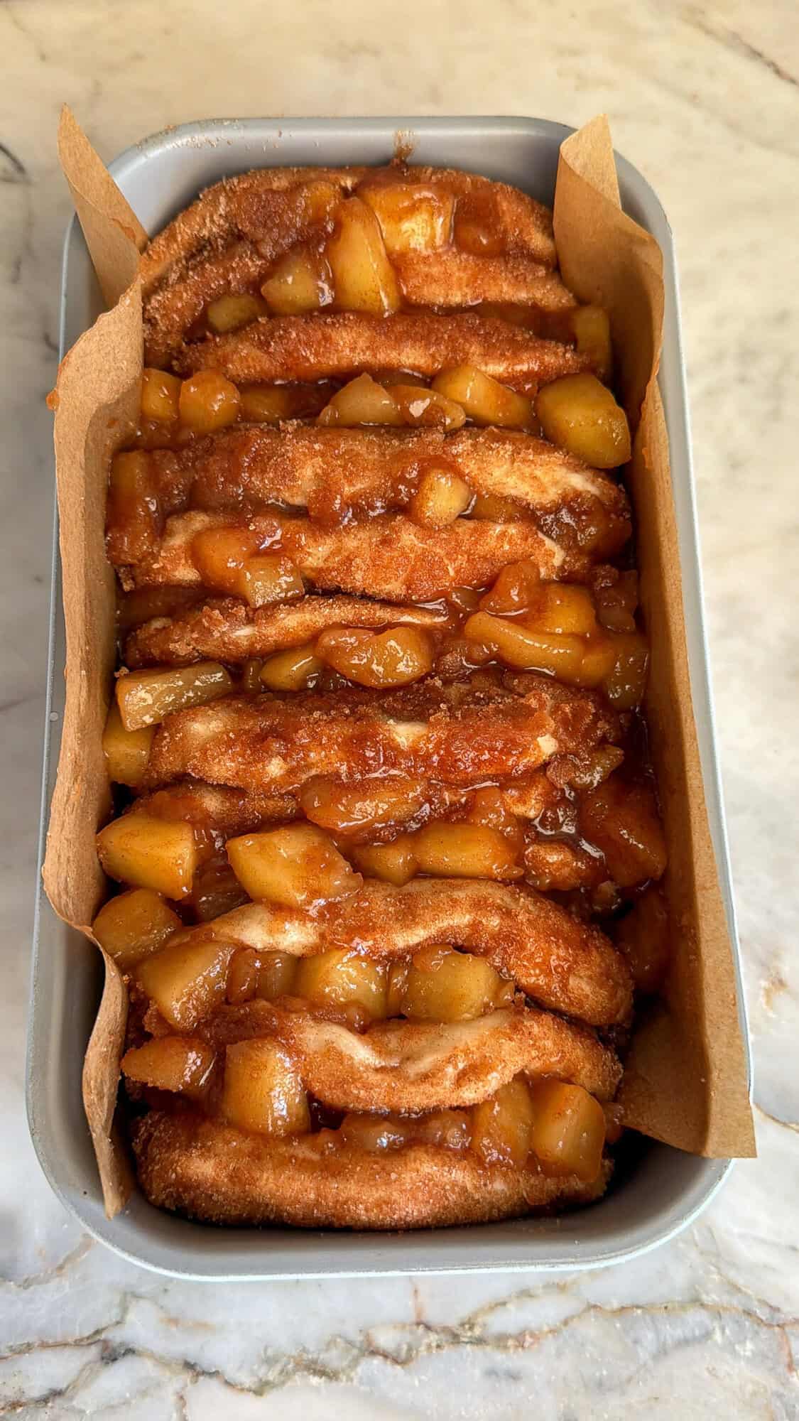 assembled apple pull apart bread in a loaf pan