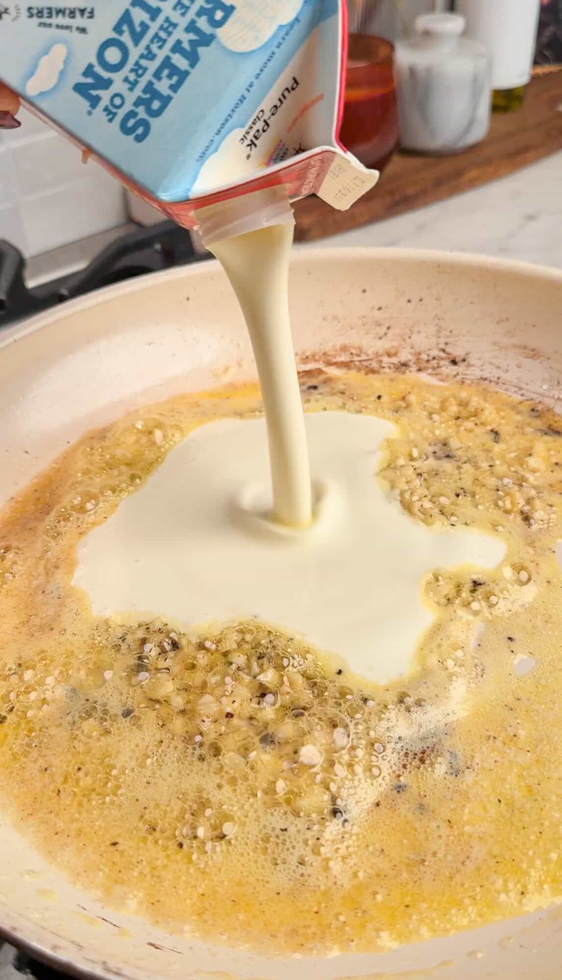 making garlic parmesan sauce