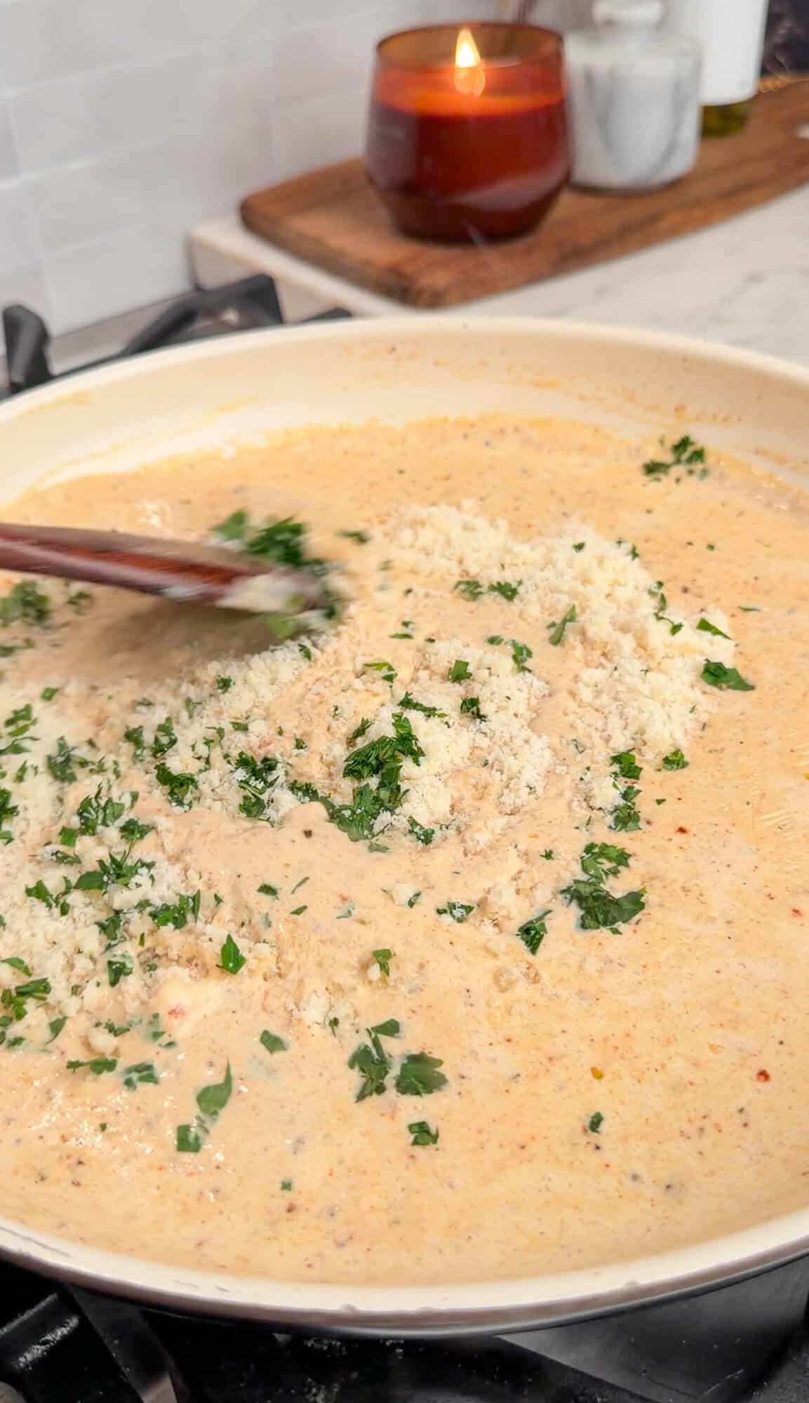 making the garlic parmesan sauce for dipped burger