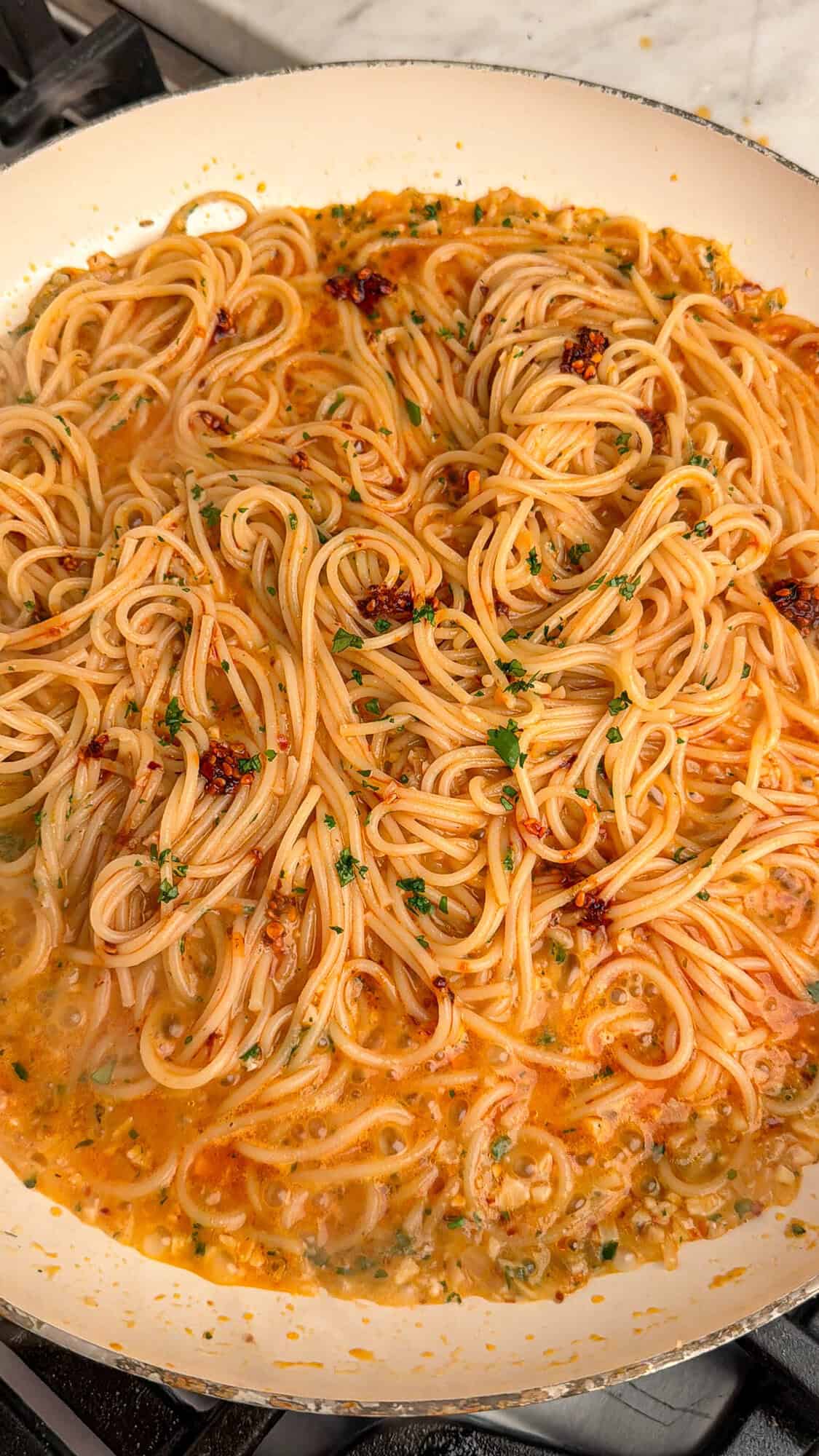 finished garlic butter pasta in a skillet