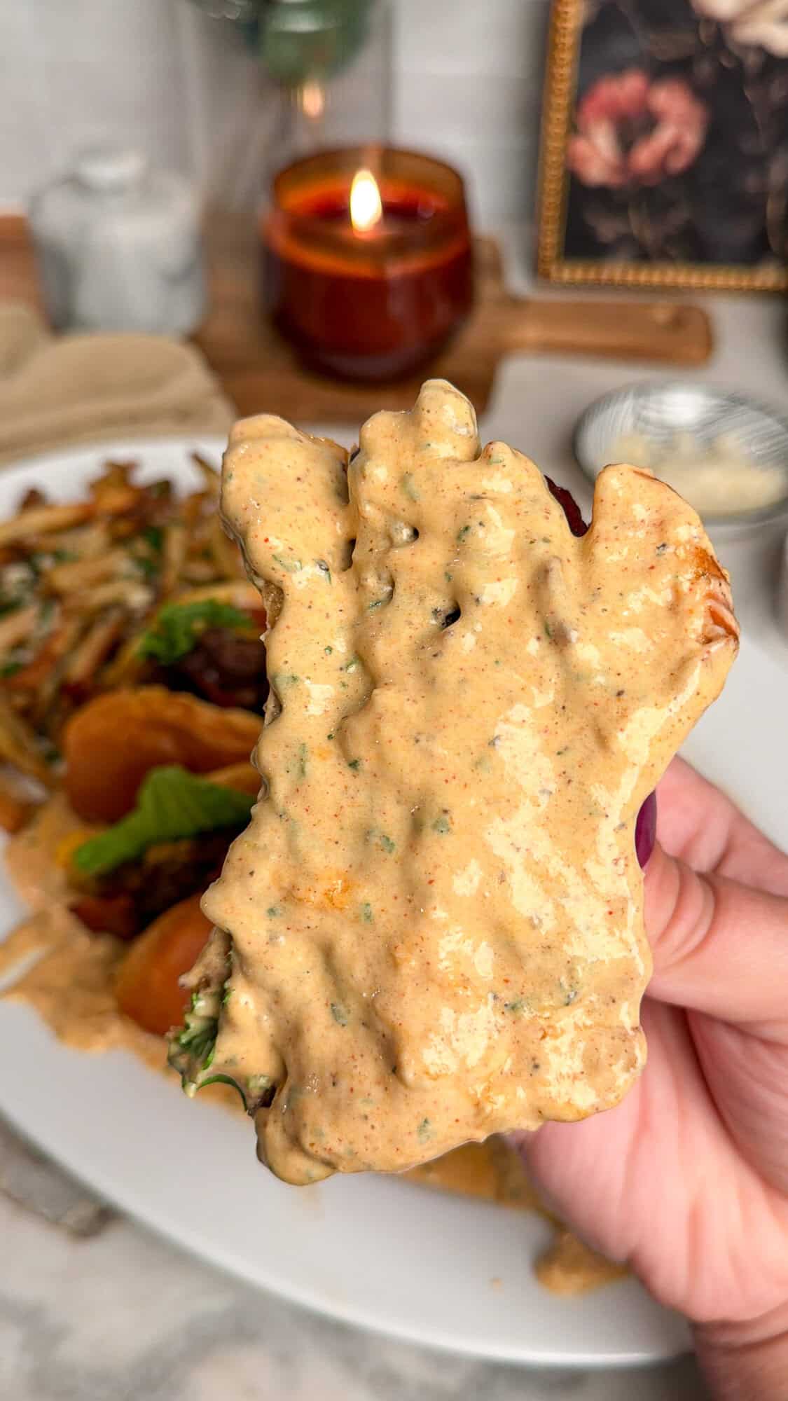 cheeseburger dipped in garlic parmesan sauce