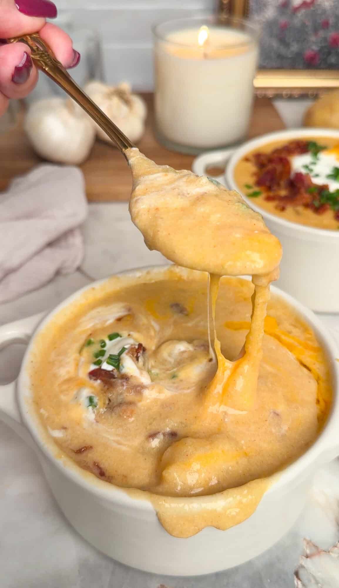 cheesy loaded baked potato soup in a bowl