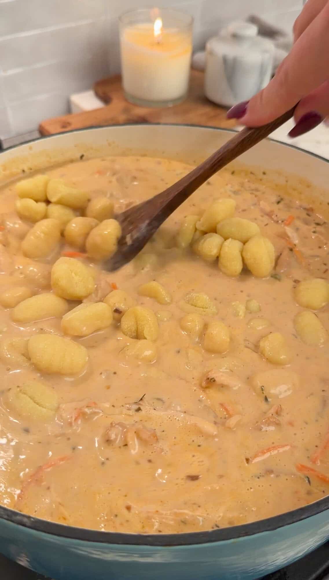 cooking gnocchi in the boiling soup