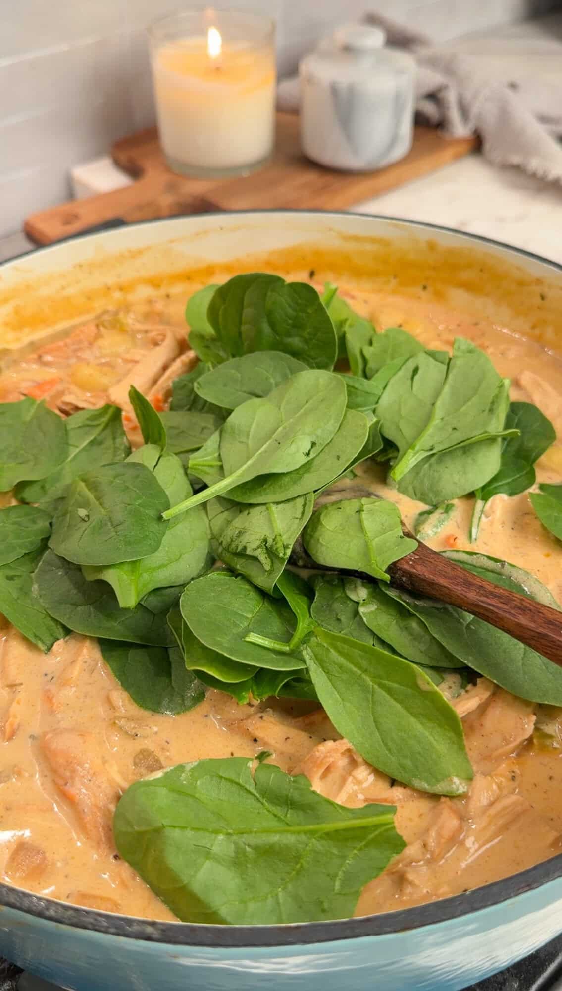 spinach added into chicken gnocchi soup