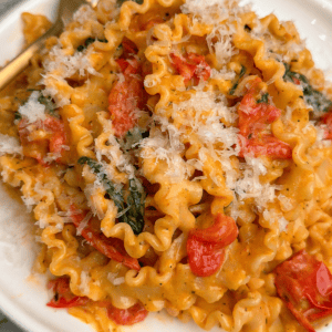 one pot creamy tomato pesto pasta on a plate