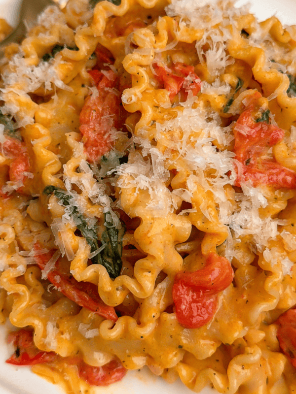 one pot creamy tomato pesto pasta on a plate